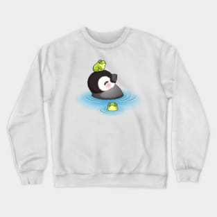 Happy emperor penguin chick with frog Crewneck Sweatshirt